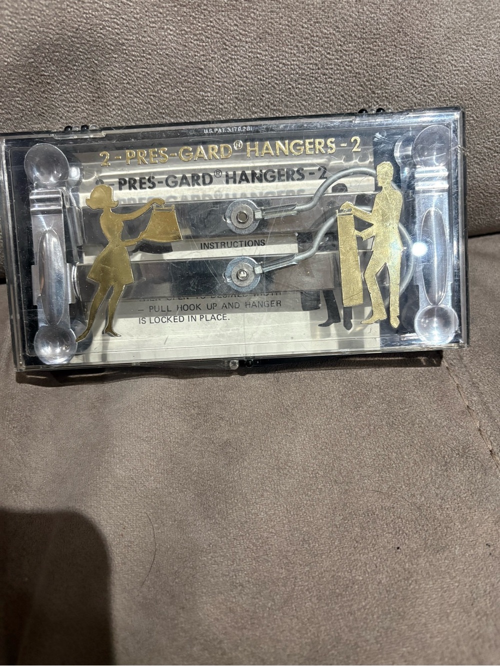 Unisex vintage Pres-Gard Hangers.
